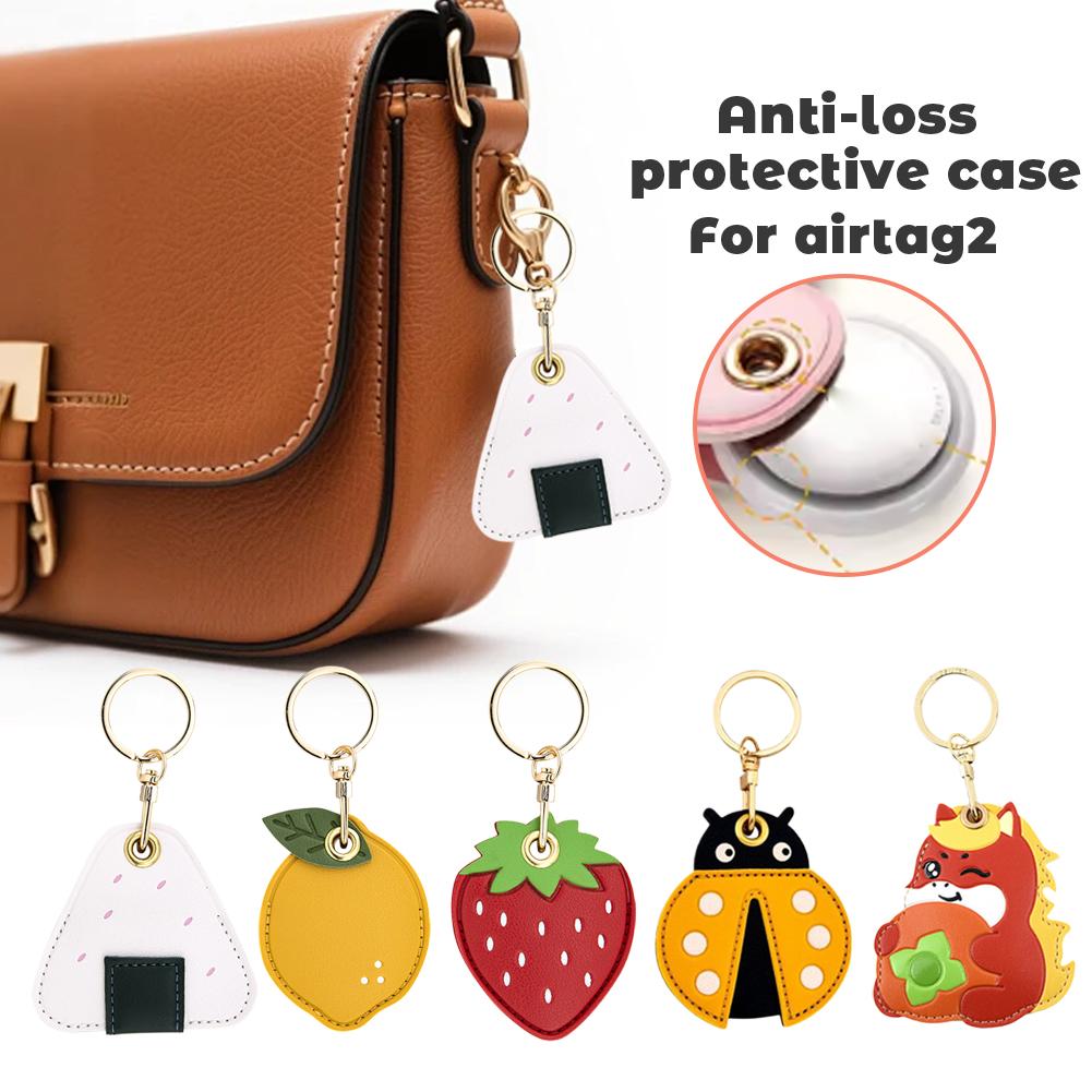 Strawberry Huller - Étui en cuir pour AirTag 2,